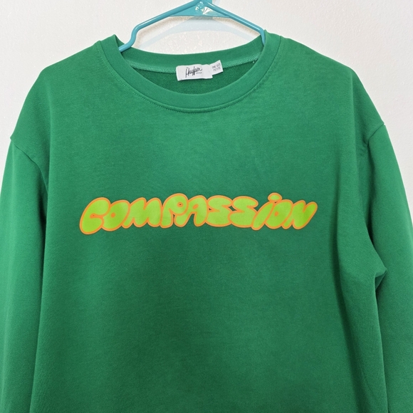 The Mayfair Group Compassion Graphic Sweatshirt In Green - Picture 2 of 10